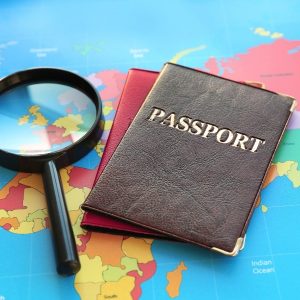 Travel documents, passport, and visa forms ready for cross-border travel