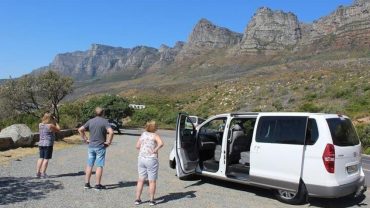 Clients taking picyures of the mountain